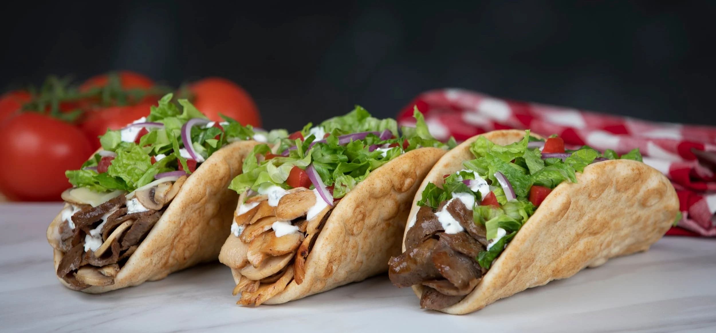 Gyro Wrap storefront in Athens, GA with guests enjoying food